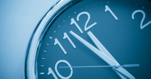 Close-up of a clock face showing the time at approximately 10:56.