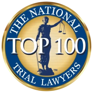 A circular gold and blue badge reads "The National Top 100 Trial Lawyers" with a depiction of Lady Justice holding scales in the center.